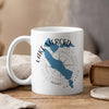 White mug with blue Lake Merced map, compass, and text.