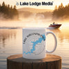 White mug with Lake Wallenpaupack map and compass design on a lake.