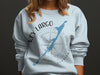 Light blue sweatshirt with Key Largo Florida map and compass design.
