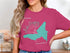 Pink t-shirt with Lake Gregory California graphic and compass rose.
