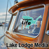 Siskiyou Life sticker on a boat window with "Lake Lodge Media" text.