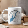 White mug with blue Great Sacandaga Lake map, compass, and text.