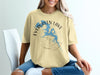 Yellow t-shirt with Evergreen Lake Illinois graphic and compass design.