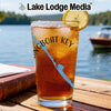 Glass of iced tea with "Spring Boat Key Florida" map design and lemon slice.