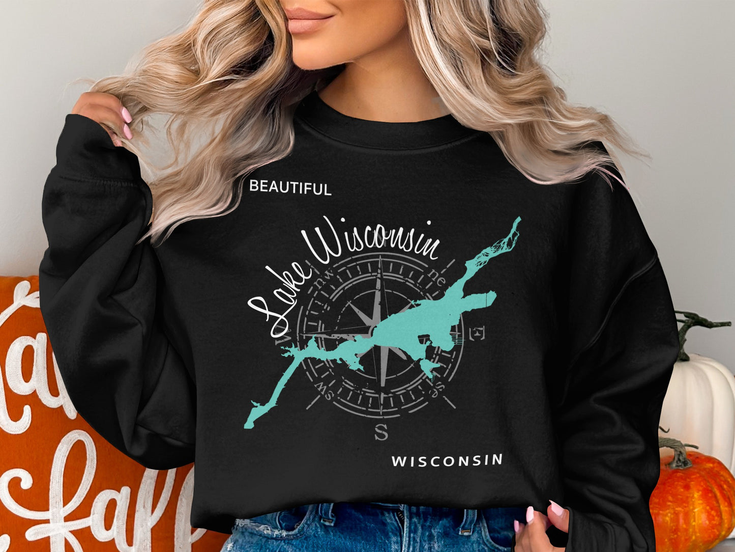Black sweatshirt with "Beautiful Lake Wisconsin" and compass design.