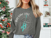Grey sweatshirt with Balsam Lake Ontario map and compass graphic.