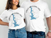 White t-shirts with "Eagle Mountain Lake Texas" and a compass rose graphic.