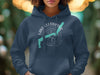 Dark blue hoodie with a circular graphic featuring "LAKE ULLSWATER", a turquoise map outline of the lake and a compass.