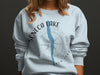 Sweatshirt with "Seneca Lake" text, a compass, and the outline of Seneca Lake, New York.