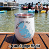 A white insulated travel tumbler with a Webster Lake design rests on a wooden boat deck.