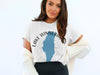 White t-shirt featuring Lake Winnebago, Missouri map with compass graphic.