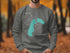 Gray sweatshirt with a teal Grand Lake Colorado map and compass design.