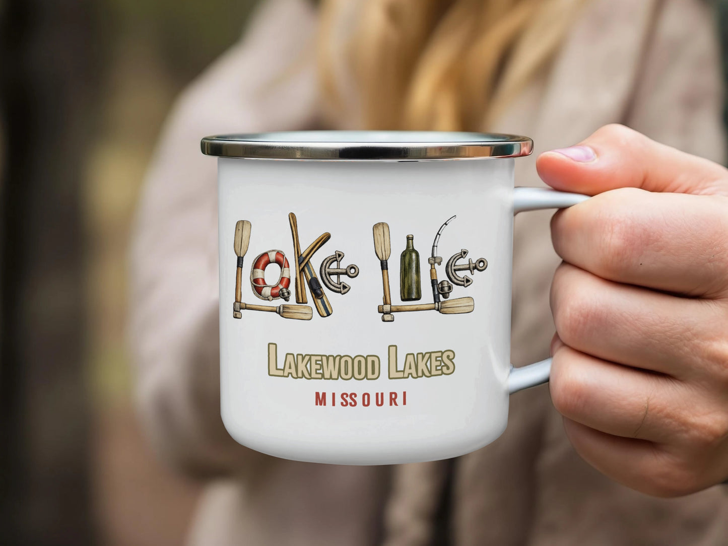 Enamel mug with "Lakewood Lakes Missouri" and nautical icons.