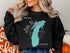 Black sweatshirt with "Lake Michigan Wisconsin" text and compass design.