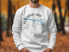 White sweatshirt with "Fontana Lake North Carolina" text and compass graphic.