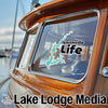 Sticker on boat window: Smithville Life logo, and Lake Lodge Media text.