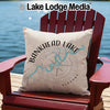 Pillow with Bankhead Lake map design and compass on a wooden chair by water.