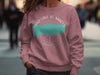 Rose sweatshirt with "GRAND LAKE ST. MARYS" text and teal lake map graphic.