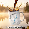 White mug with "Lake George New York" text and map over compass rose.