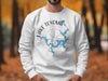 White sweatshirt with Lake Texoma design and compass graphic.
