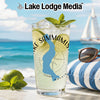 Glass with Lake Sammamish map and compass design, on a beach background.