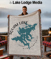 Man holding Squam Lake New Hampshire map blanket with fringed edges.