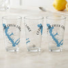 Three clear glasses feature a blue Cedar Creek Lake map design and compass rose.