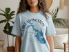 Light blue t-shirt with Lake Livingston map and compass graphic with "TEXAS" text.