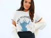 White t-shirt with "Lake Pleasant Arizona" text and blue lake outline graphic.