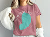 Rose t-shirt with teal Newnans Lake, Florida graphic and compass rose.