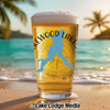 Beer glass with "Lakewood Lakes Missouri" logo on a beach with palm trees.