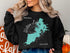 Black sweatshirt featuring "Beautiful Watson Lake Arizona" map and compass graphic.