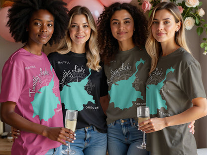 Four women in t-shirts featuring a map of Timothy Lake, Oregon.