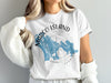 White t-shirt with Marco Island Florida graphic and compass detailing.