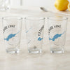 Three clear glasses with "Cedar Lake Ontario" and a blue map design.