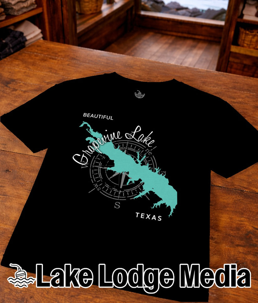 Black t-shirt featuring a teal silhouette of Grapevine Lake, Texas with a compass.