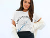 White t-shirt with "Lake Guntersville Alabama" text and compass graphic.