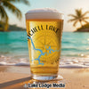 Glass of beer on a beach with "Mitchell Lake Alabama" and a lake map graphic.