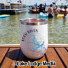 White stainless steel tumbler with Loch Raven Maryland map and compass design sitting on boat deck.