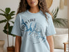 Light blue t-shirt with Falls Lake map design and compass, reading "NORTH CAROLINA".