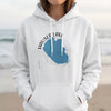 White hoodie with a Hauser Lake, Idaho graphic and compass rose.