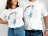 White t-shirts with "BALSAM LAKE ONTARIO" text and a compass design with a map of the lake.