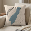 Decorative pillow with Moraine Lake Alberta map and compass design.