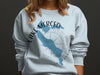 Light blue sweatshirt with Lake Merced map, compass, and California text.