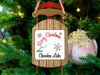 Sled ornament with "Merry Christmas from Cherokee Lake" text and snowflakes.