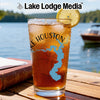 Glass of iced tea with a lemon slice, featuring "Lake Houston" and compass design.