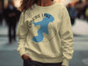 Tan sweatshirt with "Canobie Lake New Hampshire" text and lake silhouette graphic.