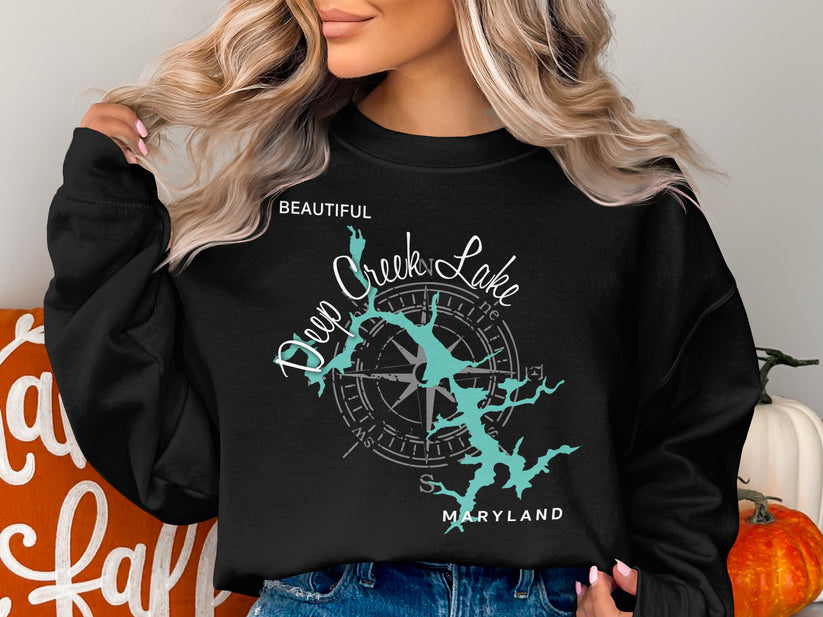 Black sweatshirt with "Deep Creek Lake Maryland" map and compass graphic.
