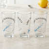 Three clear glasses with compass and Lake Guntersville, Alabama map design.