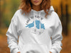 White hoodie with Lake Superior map graphic and compass rose detail.